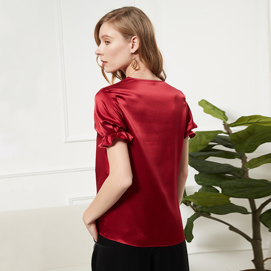 Blouse femme en soie ivoire à col drapé et manches volantées