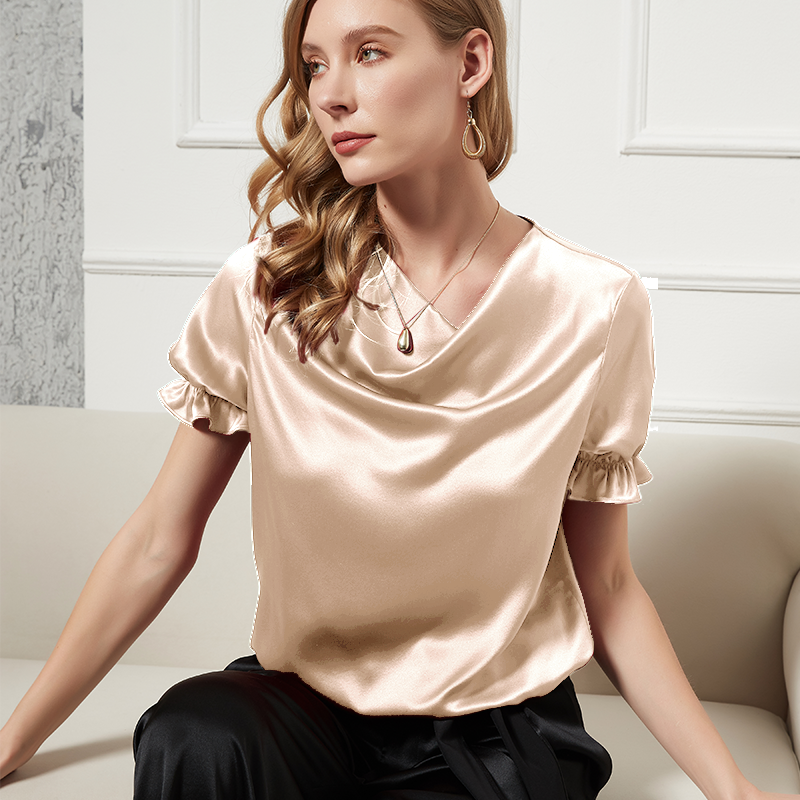 Blouse femme en soie ivoire à col drapé et manches volantées